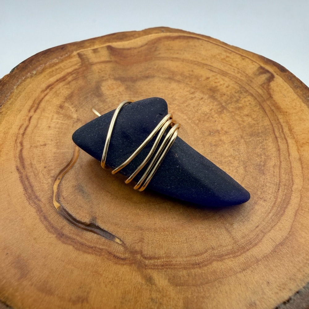 Hand wrapped Navy Blue Tumbled Pendant with Gold Wire Wrap